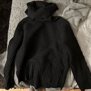 Cowl turtleneck sweater with side slits